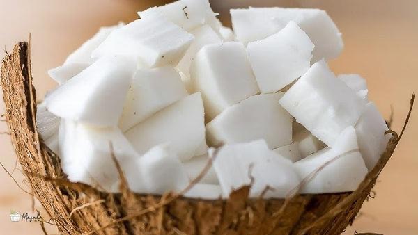 Dried coconut copra prepared for oil extraction
